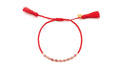 Rotes geflochtenes Macramé-Armband mit Rhodonit-Perlen, vergoldeten Perlen und zwei roten Quasten