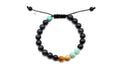 Macramé-Armband mit dunklen Dumortierit-Perlen und Akzenten aus Tigerauge und Türkis, verstellbarer Zugverschluss