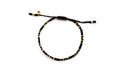 Schwarzes geflochtenes Macramé-Armband mit kleinen vergoldeten Perlen und Zugverschluss