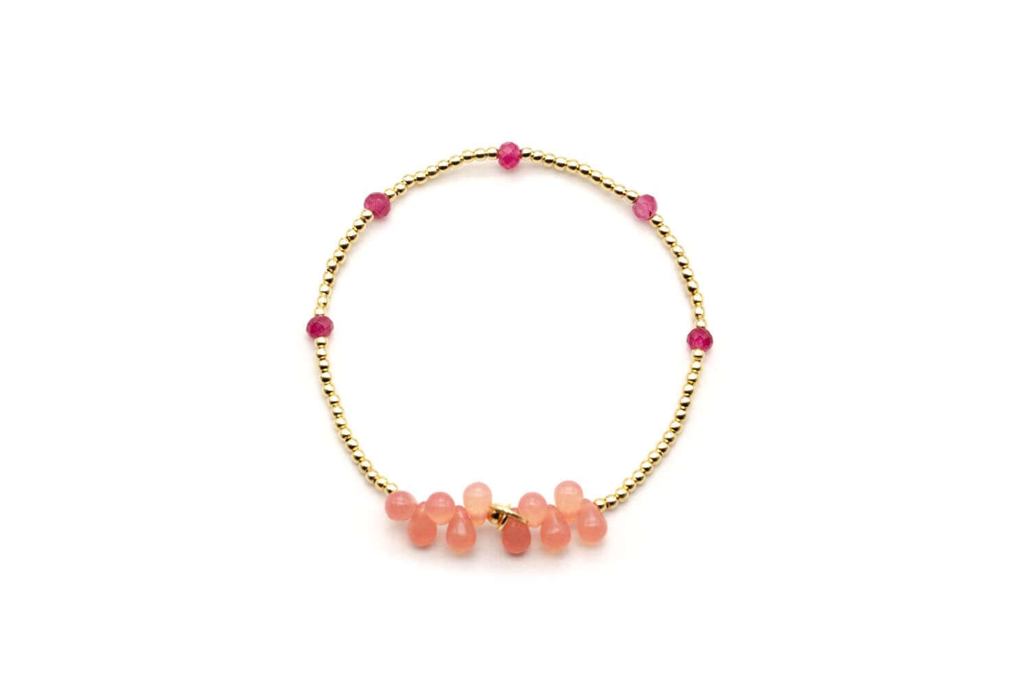 Armband auf Elastikband mit vergoldeten Perlen, rosafarbenen Tropfen und pinken Edelsteinen