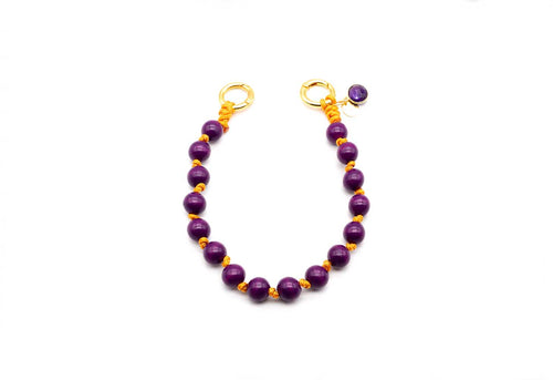 Kurze Handykette aus geflochtenem Nylon mit dicken violetten Holzperlen, goldfarbenen Ringen und Amethyst-Anhänger